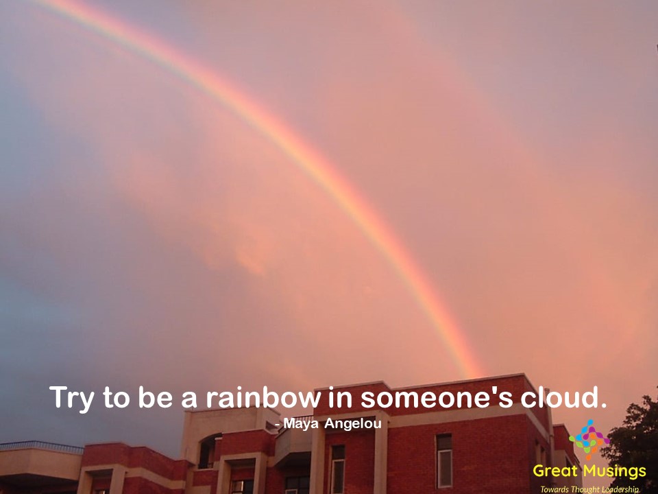 Maya Angelou Clouds Quotes in a colorful pic with rainbow